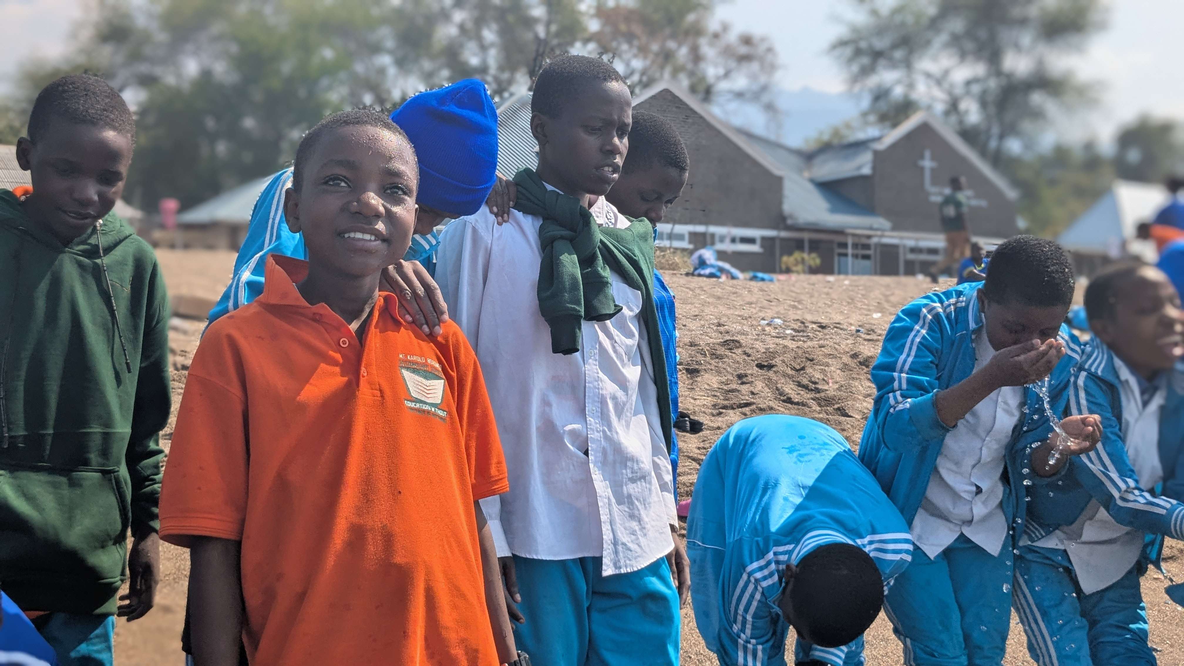Students enjoying their time at Lake Nyassa beach